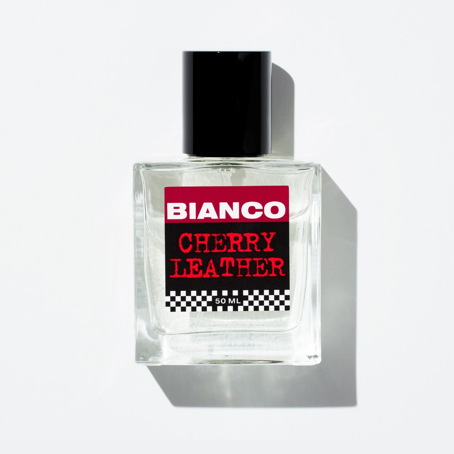 Bianco Profumo Cherry Leather with notes of Bitter Fennel, Star Anise, Black Pepper, Saffron, Ambrette Seed, Cherry, Bitter Almond, Guaiacwood, Pine Tar, Suede, Amber, Oakwood, Moss, and Musk. Bottle on clean white background.