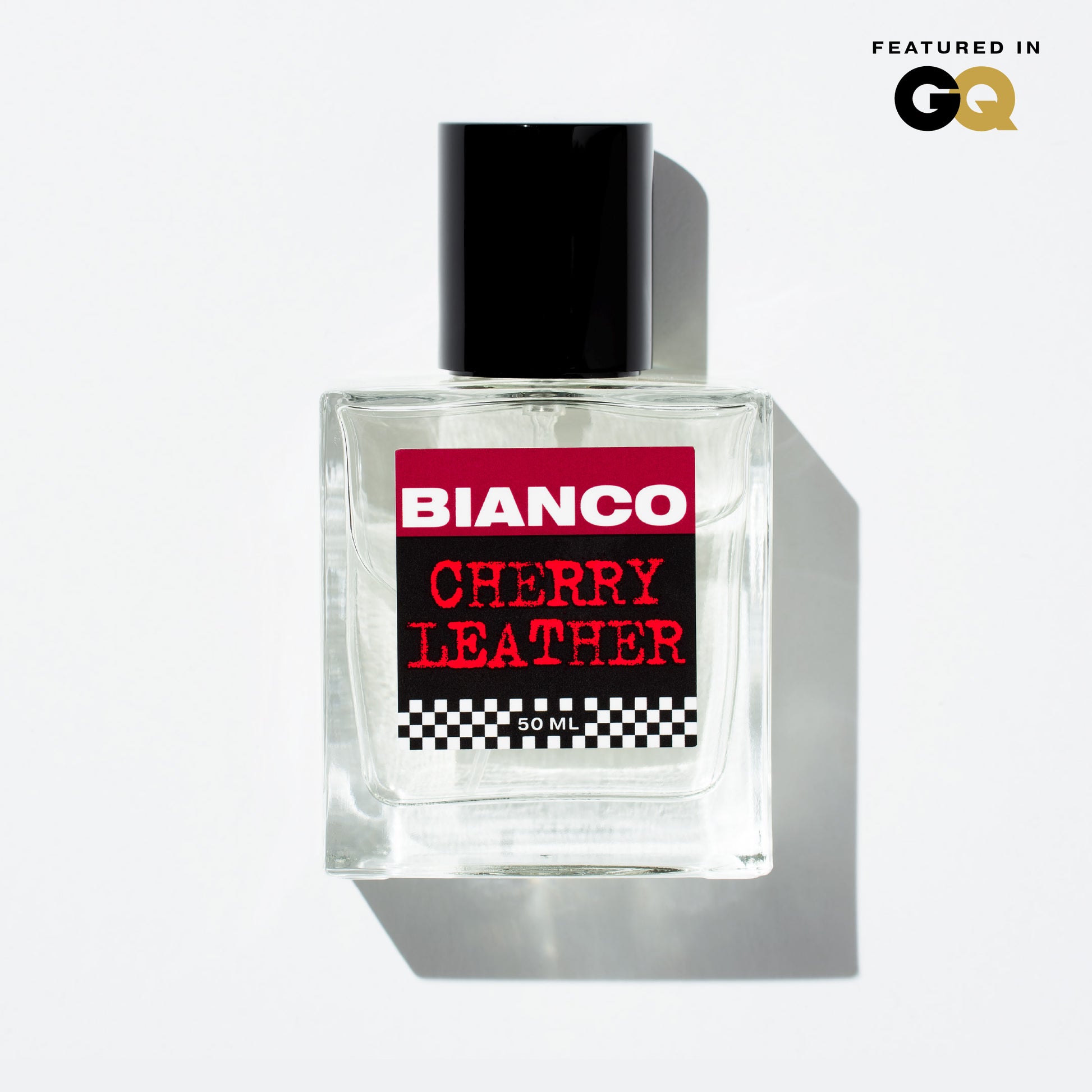 Bianco Profumo Cherry Leather with notes of Bitter Fennel, Star Anise, Black Pepper, Saffron, Ambrette Seed, Cherry, Bitter Almond, Guaiacwood, Pine Tar, Suede, Amber, Oakwood, Moss, and Musk. Bottle on clean white background.